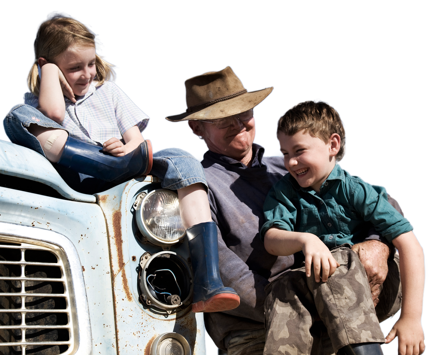 A farming family, grandfather with his grandchildren.